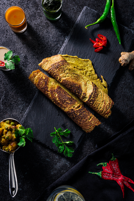Food Fotografie und Food Styling von gerollten Dosa, einer traditionellen indische Speise